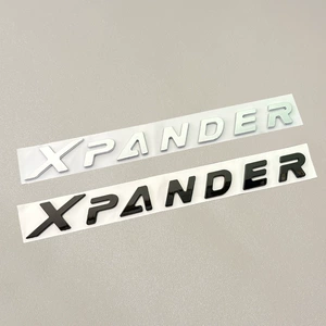 Mitsubishi Xpander kapot, ön və arxa baqaj loqosu, ingilis hərfləri