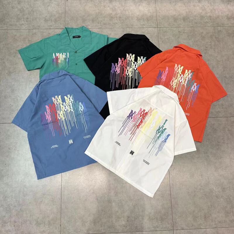 Cross-Border Wholesale Amiri Colorful Splash-Ink Letter Logo Printed T-Shirt, Shirt, Shorts, and Five-Quarter Pants Set for Men and Women Cross-Border Wholesale Amiri Colorful Splash-Ink Letter Logo Printed T-Shirt, Shirt, Shorts, and Five-Quarter Pants Set for Men and Women