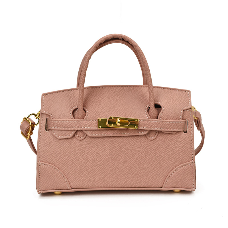 Coreano simple color sólido bolso de hombro para niños y niñas pequeño mini bolso de mano bebé nuevo bolso de comercio exterior transfronterizo para niños