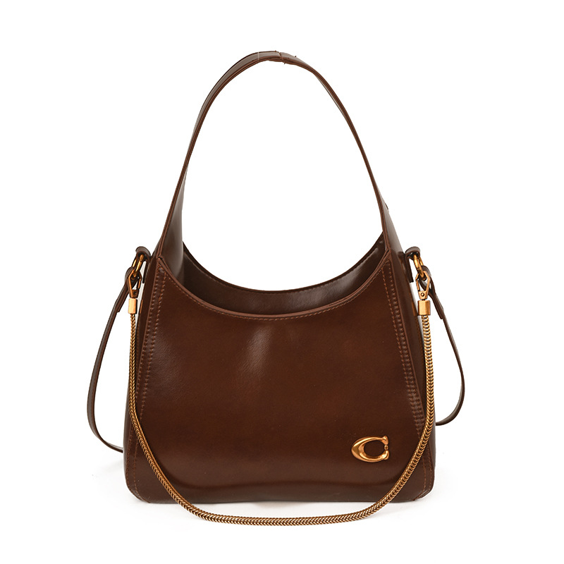 Bolsa de hombro Europa y América primavera y verano nuevo estilo perezoso bolso de brazo de viaje versátil de gran capacidad bolso de hombro de color sólido bolso de mujer
