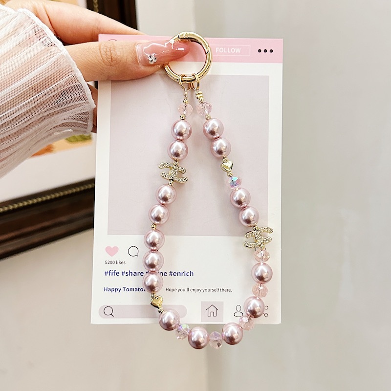 Boutique hecho a mano de alta gama cadena de teléfono móvil cadena de pulsera de perlas de tres colores cordón de teléfono móvil de moda colgante de mensajero largo