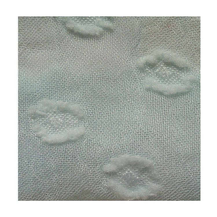 现货供应春夏薄款雪纺剪花布雪纺绉提花圆点时尚女装连衣裙面料