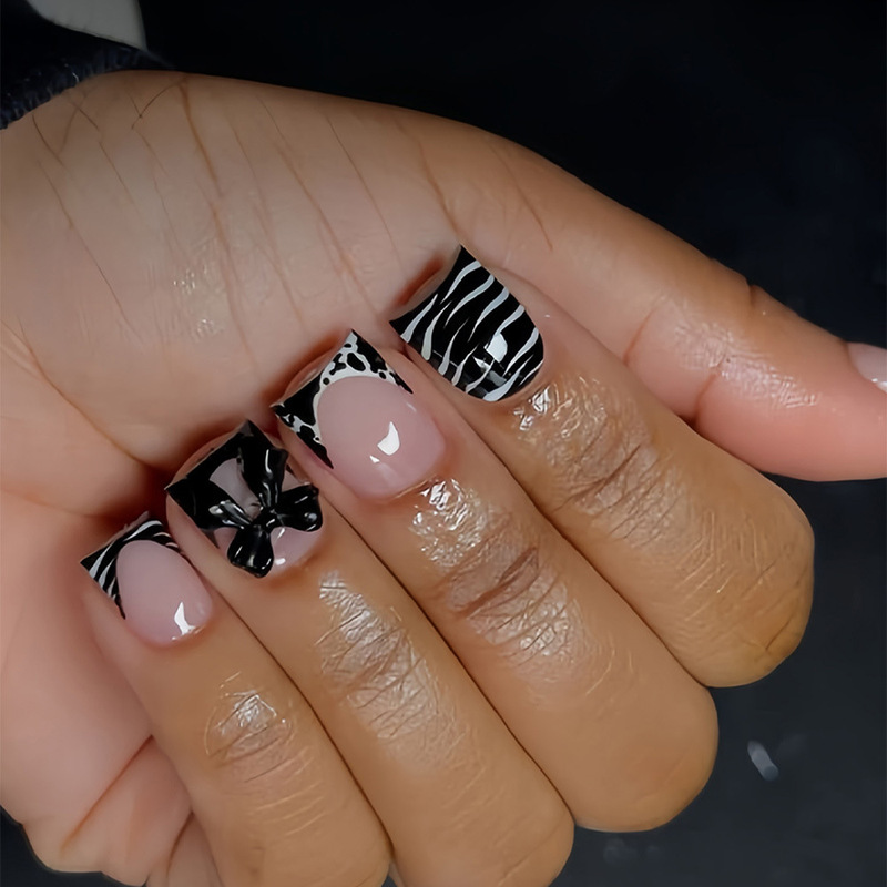 Cross-border best-selling popular press-on nails in black and white French style with white stripes, black bow, and cow print color scheme Cross-border best-selling popular press-on nails in black and white French style with white stripes, black bow, and cow print color scheme