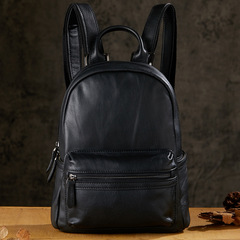 手作りのトップの牛革のリュックサックは男女のファッション的なレジャー旅行の小さいリュックサックの本革の潮流に合わせてカバンの女性バッグを使います。