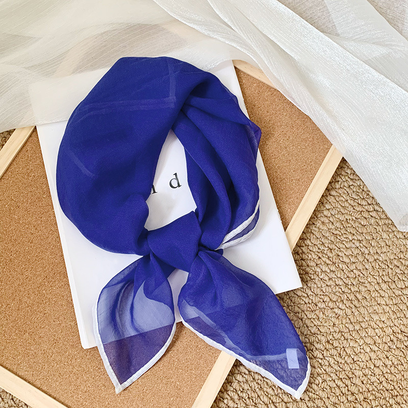 Azul pavo real con borde blanco