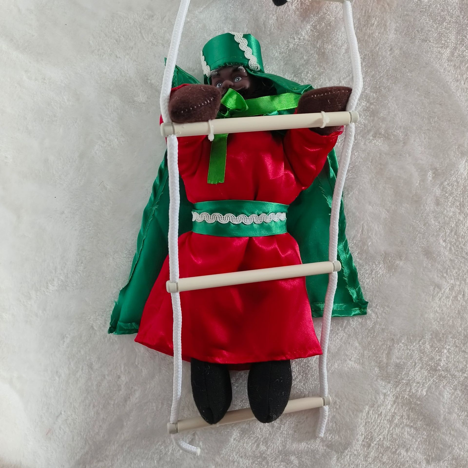 Tres reyes transfronterizos españoles escalera muñeca cara blanca cara negra, cara amarilla rey escalera regalos del día de la infancia español