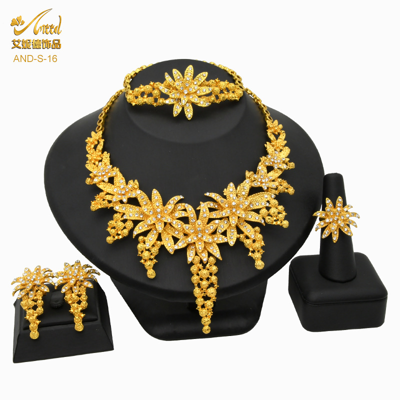 Dubai joyería de oro flor India joyería nupcial traje de las mujeres sauditas collar pulsera pendientes anillo de cuatro piezas conjunto