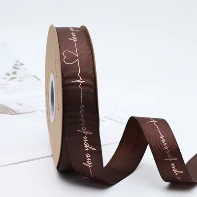 Cinta de embalaje de flores Cinta de seda estampada en caliente Letras inglesas Ramo de flores Cinta de lazo de 2,5 CM