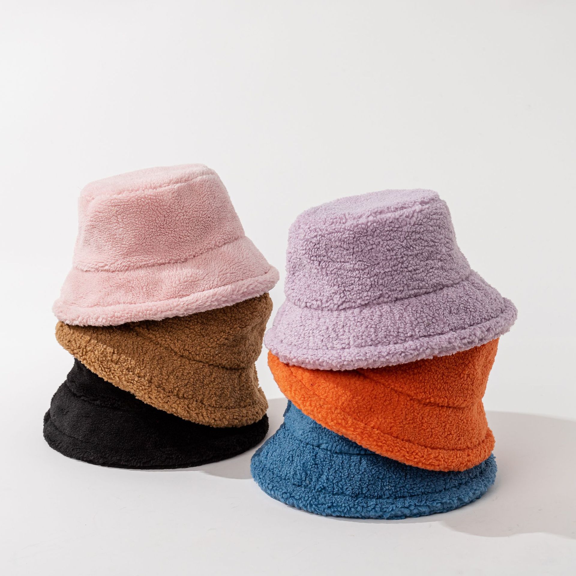 Sombrero de pescador de lana de cordero de color sólido para hombres y mujeres otoño e invierno nuevo cálido sombrero de cuenca engrosada gran circunferencia de la cabeza sombrero simple de todo fósforo