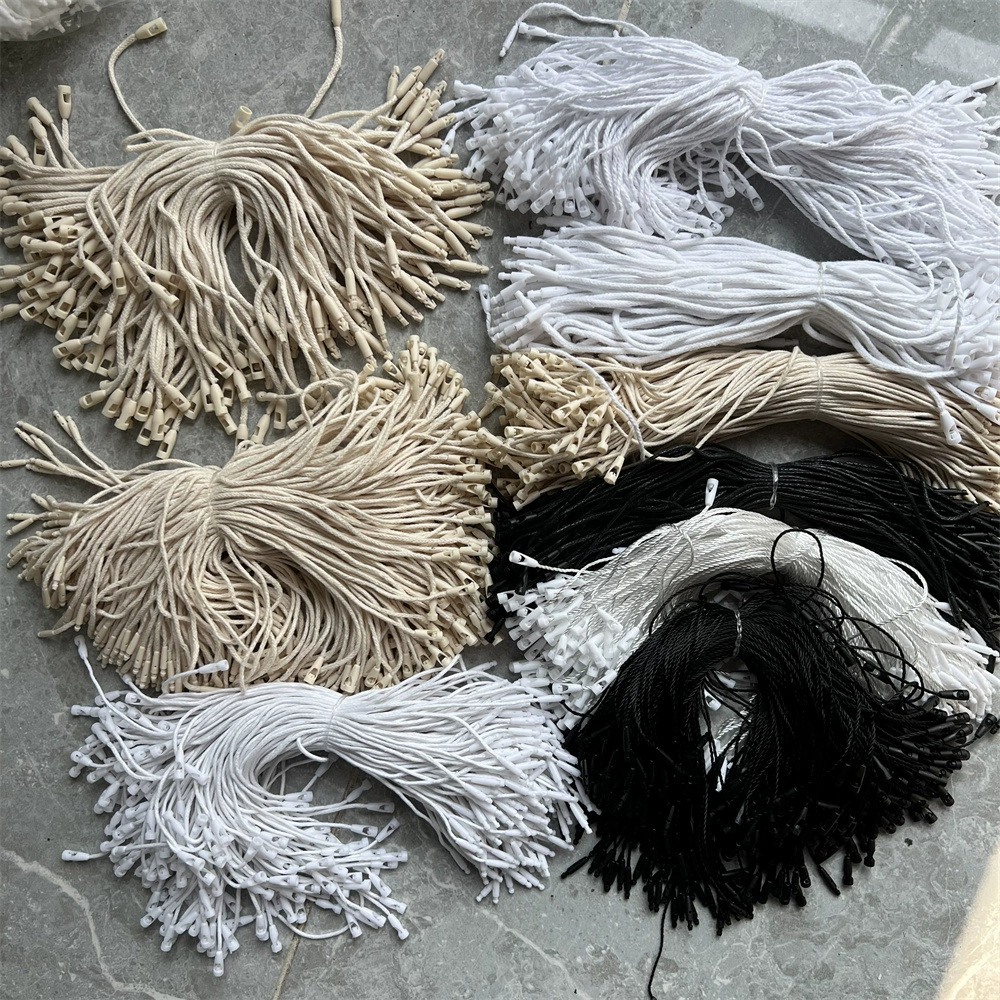 Одежда универсальная висит зерна хлопчатобумажная веревка пуля висит зерна фабрика одежды багажная бирка карта висит веревка