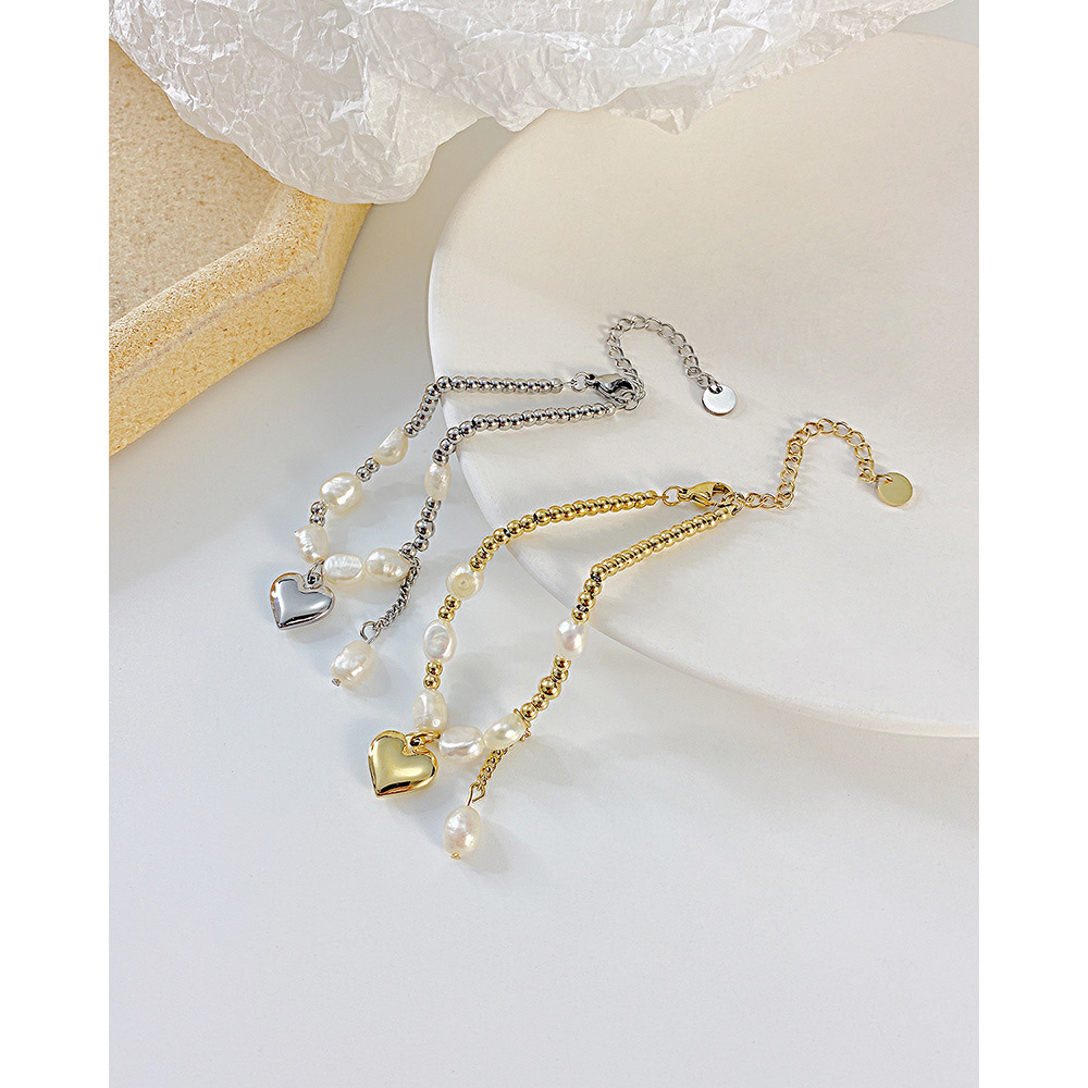 Nouveau Bracelet En Acier Inoxydable Avec Perles D&#39;eau Douce Et Coutures De Coeurs De Pêche Rétro En Gros display picture 4
