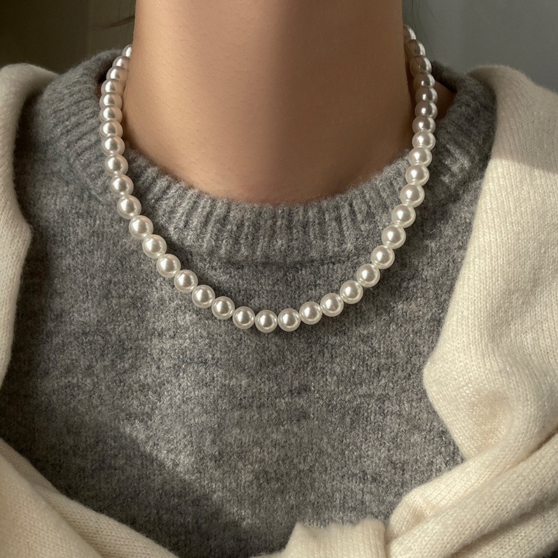Collar de perlas con lazo de flor con cuentas francesas Elegante cadena de clavícula con sentido de alta gama retro ligero decoración de lujo femenino
