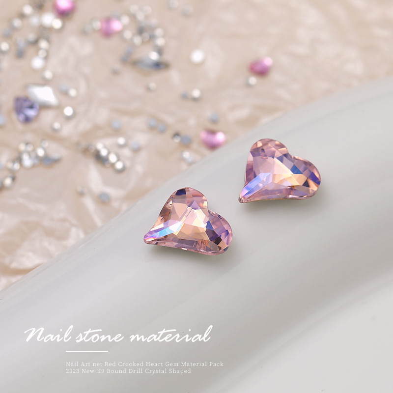Arte de uñas celebridad en línea corazón torcido gema material paquete nuevo K9 cristal de diamante redondo tamaño especial en forma de diamante decoraciones de uñas al por mayor