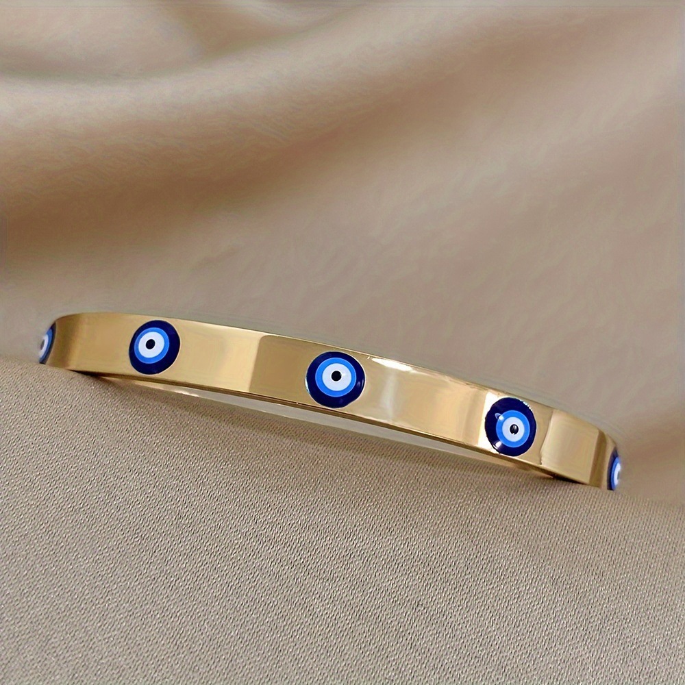 Guldbelagt evil eye armring för herr och dam_voghion.com