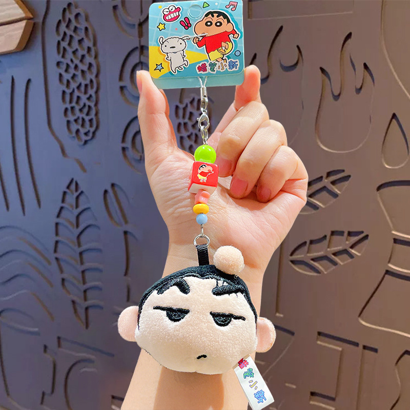 Crayons, mobile phone, pendant, cloth, doll