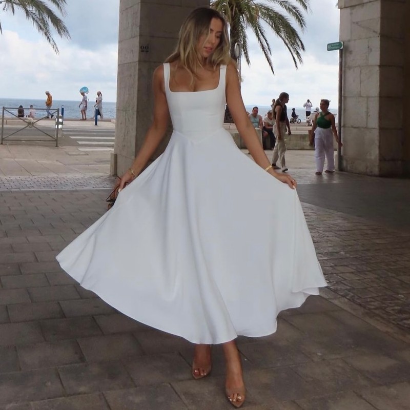 Comercio exterior Amazon 2025 primavera y verano nueva ropa de mujer europea y americana temperamento color sólido cuello cuadrado cintura sin mangas vestido de tirantes