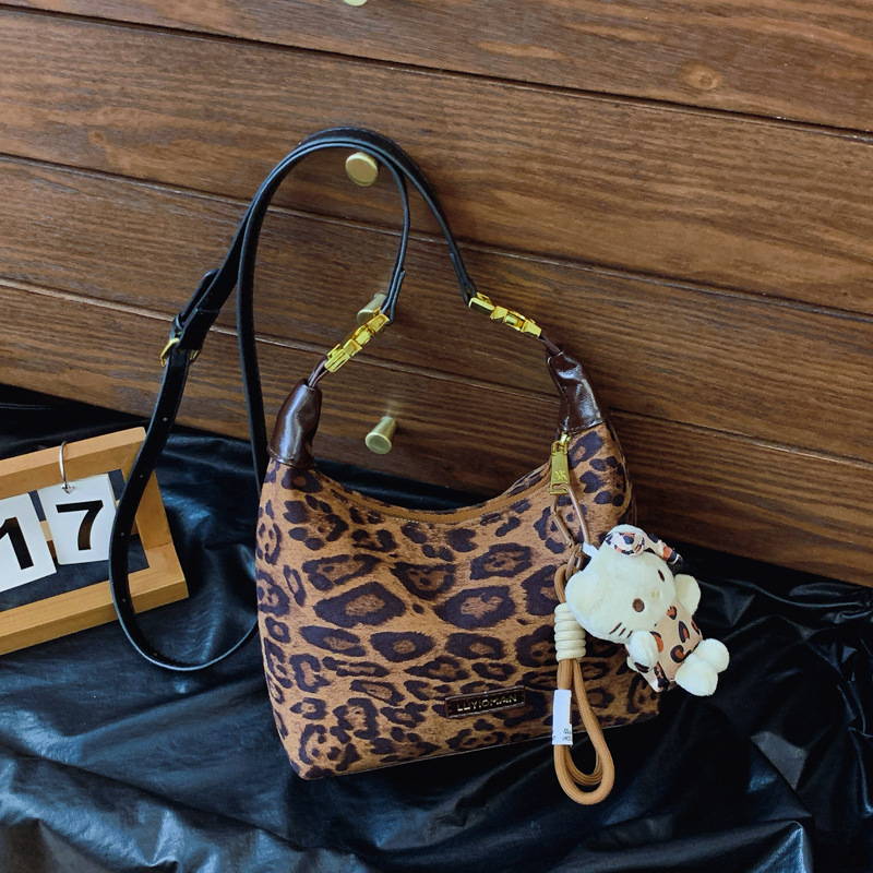 Otoño y invierno de moda nicho leopardo bolso para mujeres 2024 nuevo popular bolso de hombro amplio bolso de brazo