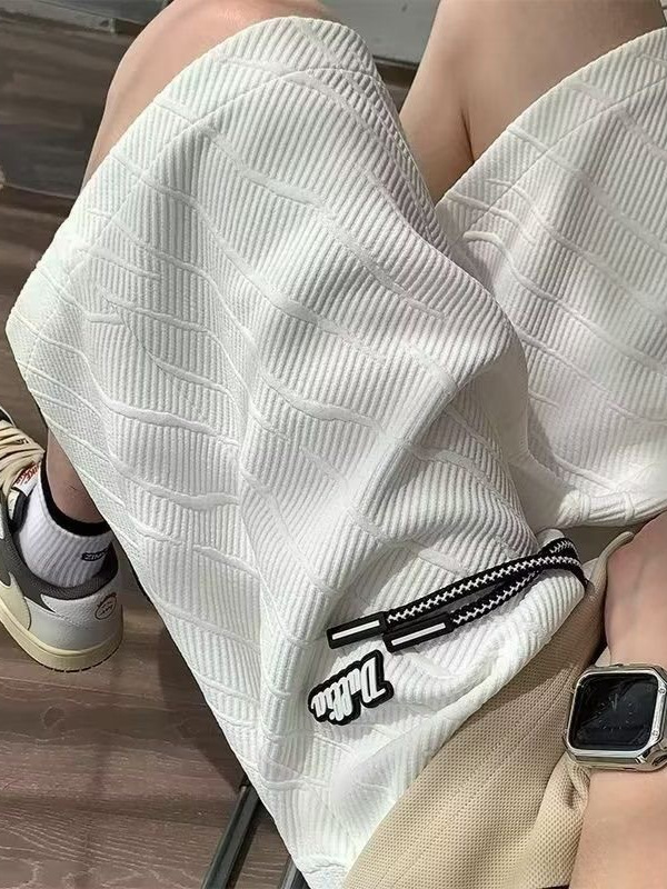 Pantalones cortos casuales de carretera con textura de textura de alta calidad, pantalones de cinco puntos de la marca de moda, pantalones de todo fósforo de estilo de Hong Kong, guapos