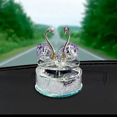 Car Perfume Holders Aromatherapy – Car ornaments - solar-rotating-purple-swan