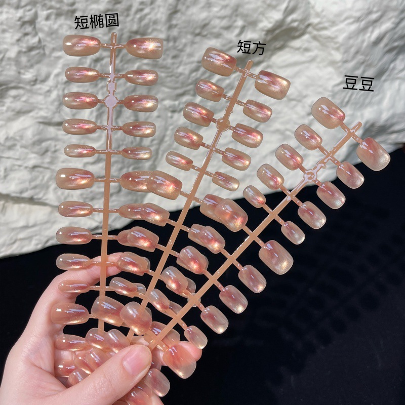 New In-Stock Cat-Eye Nail Tips That Enhance Complexion, with Gradient Amber Design, Available in Short, Medium, and Long Styles
