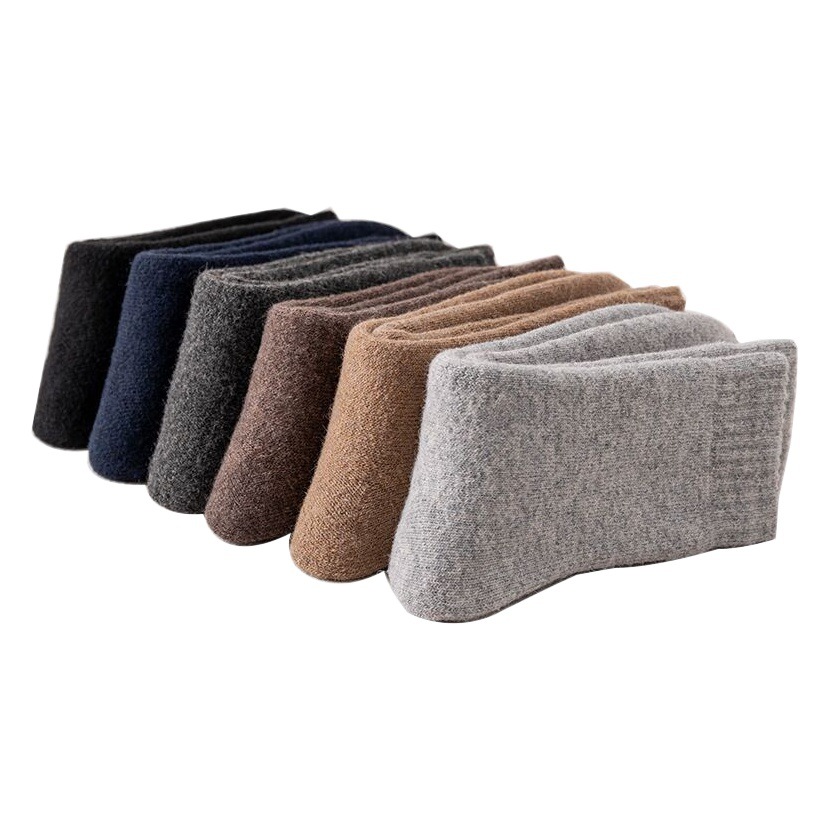 Calcetines de invierno al por mayor Calcetines de mitad de la pantorrilla de las mujeres engrosada toalla caliente forrada de lana Terry Calcetines de otoño e invierno calcetines de confinamiento del sueño