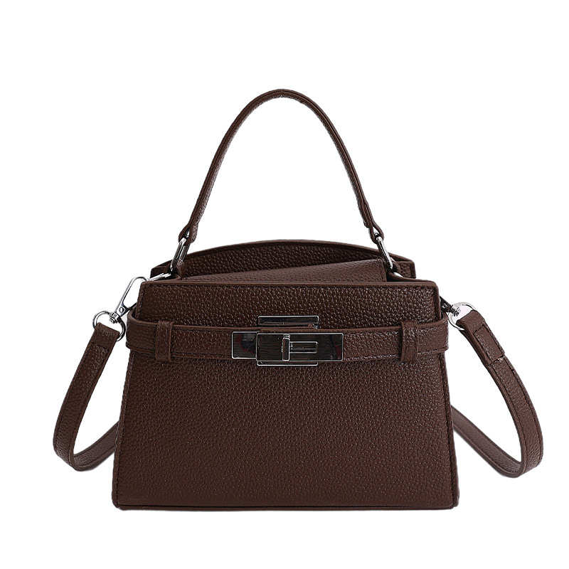 Bolso de mano de alto nivel de estilo occidental para mujeres 2026 nuevo retro nicho Kelly bolsa de viaje universal mochila de hombro