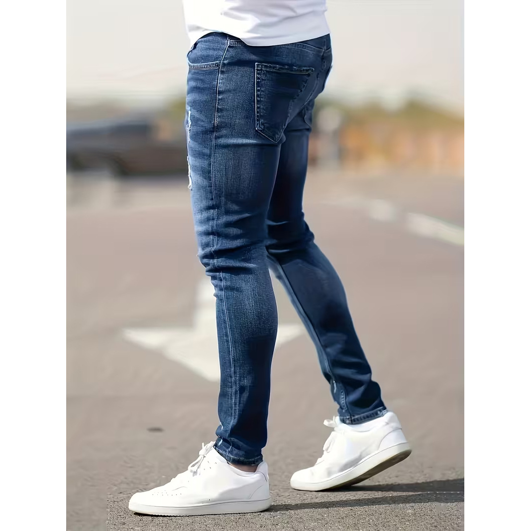 Jeans da uomo slim fit in denim elasticizzato | Jeans skinny strappati e dall'aspetto vissuto per uno stile casual da strada | Tessuto elasticizzato e confortevole_voghion.com