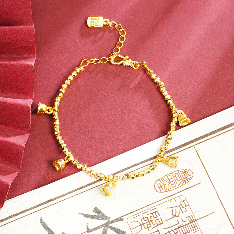 Brazalete de oro de arena de Vietnam lujoso ligero bungee ojo de gato mariposa campana de cuatro hojas brazalete joyería de aleación de cobre al por mayor