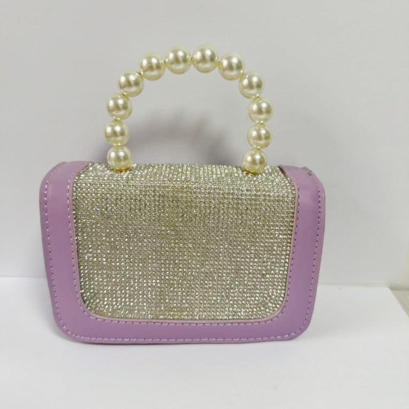 2025 primavera y verano estilo caliente moda casual niños dulces bolsa de gelatina mini bolso de mensajero de un solo hombro variedad al por mayor