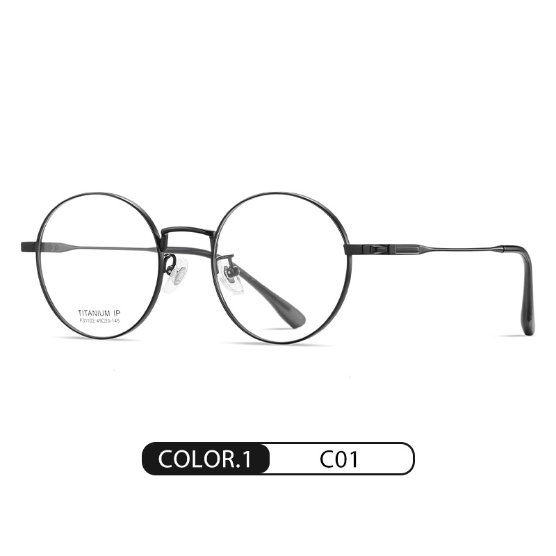 El nuevo marco de gafas de titanio puro F31102 de moda para hombres y mujeres con el mismo estilo puede equiparse con gafas de miopía, espejo plano redondo galvanizado IP