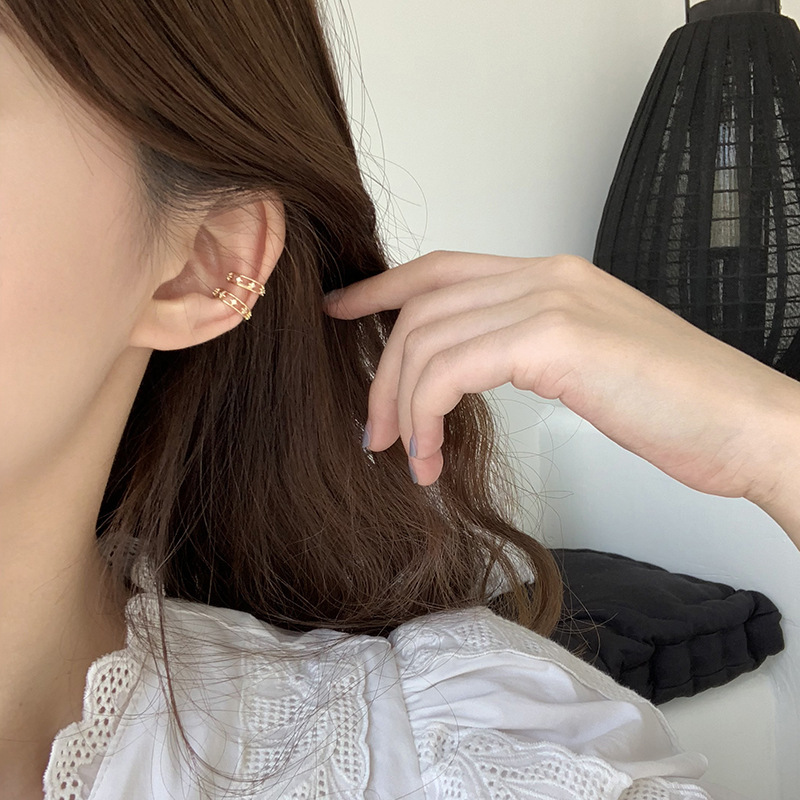 Estilo coreano ins nicho diseño simple todo fósforo hueco circonio diamante oreja hueso clip hembra oreja sin oreja clip pendientes de estilo frío