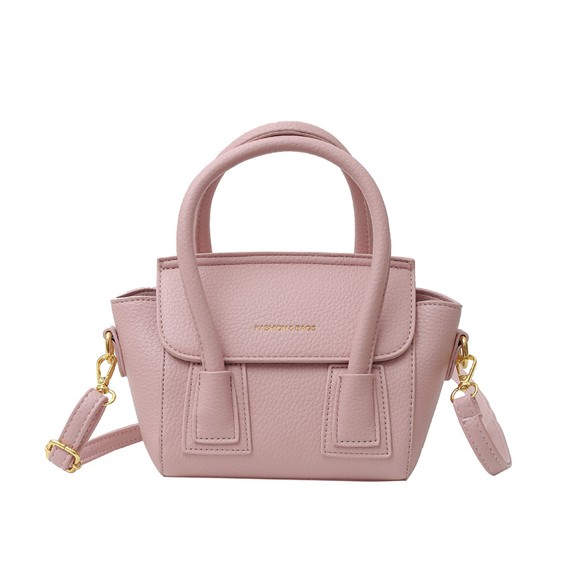 Bolsos populares de este año 2025 primavera nuevo bolso femenino casual patrón de lichi bolso de hombro letra todo fósforo bolso de mensajero