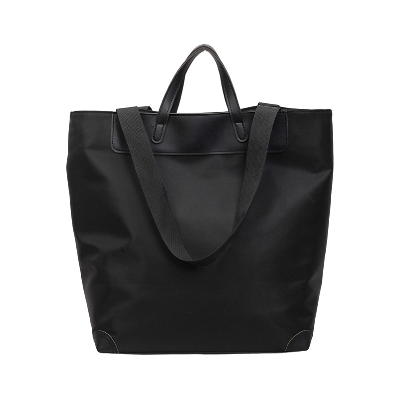 Nuevo estilo coreano de alto valor, bolso de mano casual simple, bolso de hombro de gran capacidad de viaje ligero de tela de nylon.
