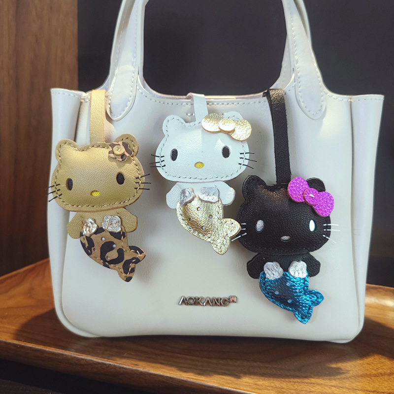 黑皮美人鱼真皮皮包公仔可爱夏威夷真皮包玩偶挂件挂饰hellokitty|undefined
