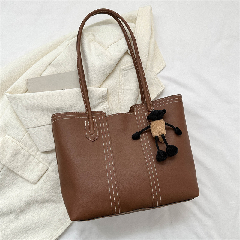 Estilo coreano versátil bolso texturizado de las mujeres 2023 otoño e invierno nuevo hombro axila bolsa popular bolsa de asas este año
