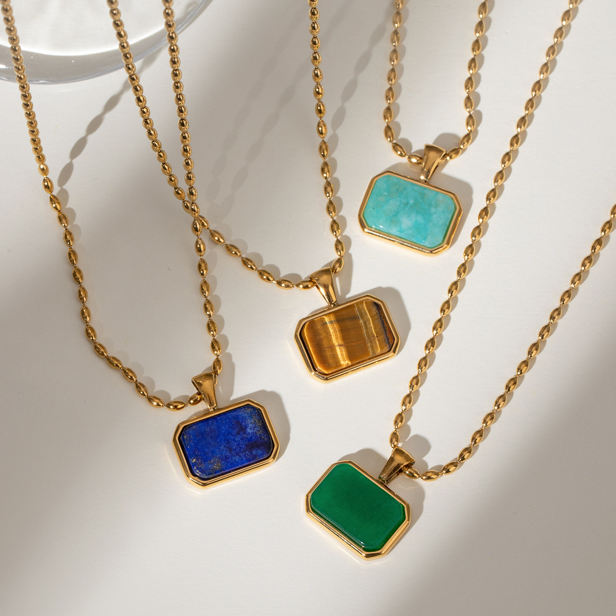 Wanxing estilo europeo y americano 18k oro de acero inoxidable collar de piedra de ojo de tigre universal mujer lujo ligero nicho alto sentido de joyería transfronteriza