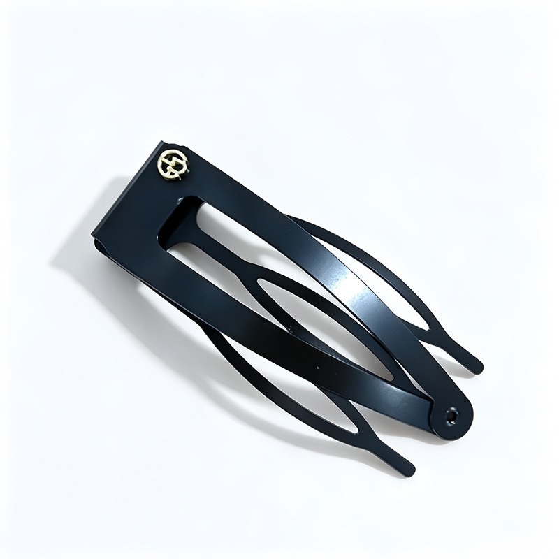 1 # Black comb clip, approximately 7cm