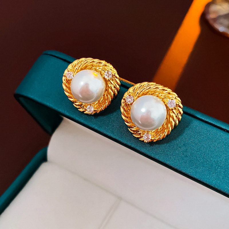 Pendientes de perlas de aceite con goteo de aguja de plata Pendientes de todo fósforo de moda, lujo ligero, joyería retro de alta gama al por mayor, fabricante de Yiwu