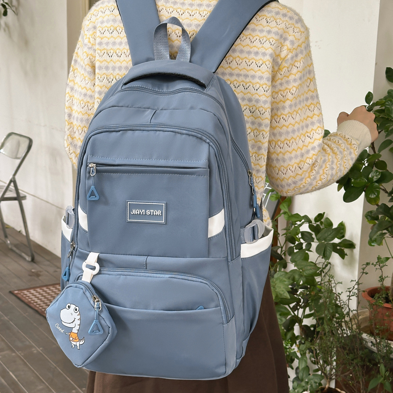 Mochila coreana de alto valor transfronterizo nueva mochila de viaje corto multicapa para reducir la carga, mochila de estudiantes de gran capacidad