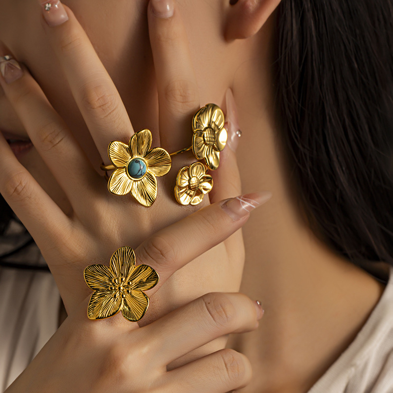 Anillo de acero de titanio universal TENA Europa y América nicho de diseño femenino anillo de flores anillo de acero inoxidable joyería de mano de alta calidad
