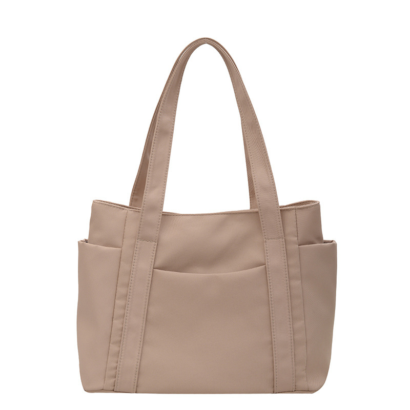 Bolso de gran capacidad para mujeres, nuevo estilo de moda, bolso de nylon, bolso de hombro casual, bolso de mano simple para mujeres.