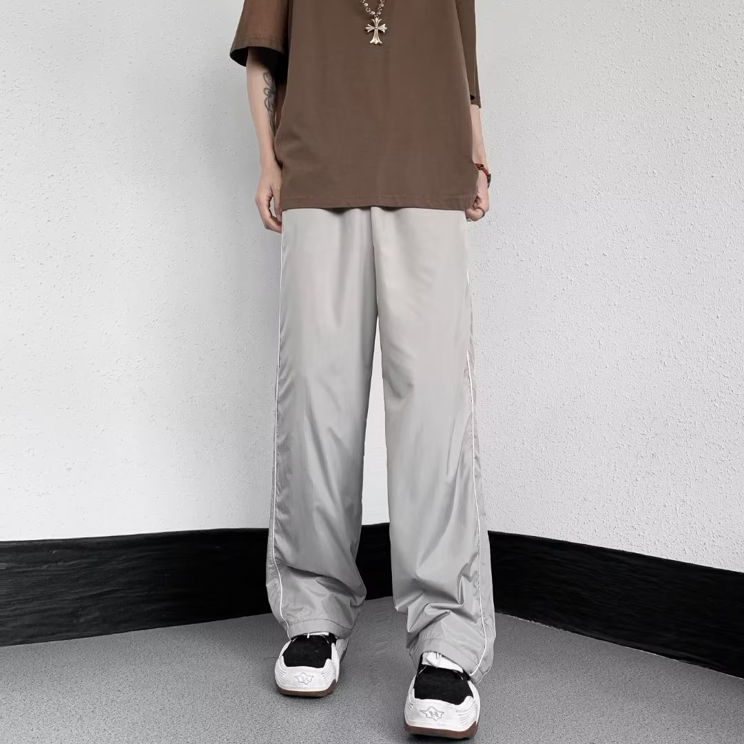 Pantalones funcionales americanos pantalones impermeables al aire libre hombres American High Street Vibe pantalones de pierna ancha de seda de hielo pantalones casuales a rayas