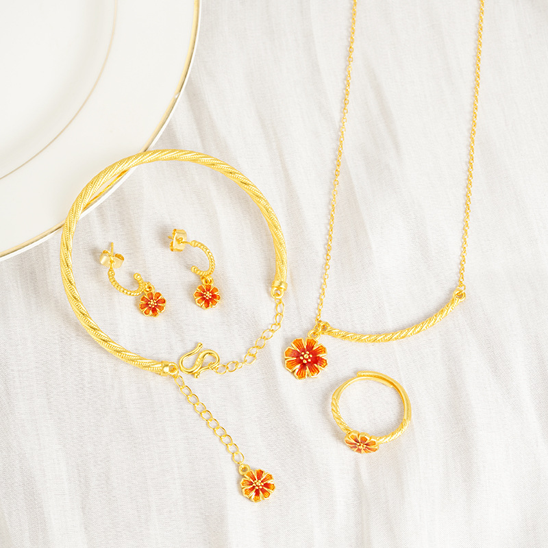 Vietnam Shajin Gesang Flower Series Pendientes Collar Anillo Temperamento simple Pulsera Twist Juego de cuatro piezas de imitación de oro