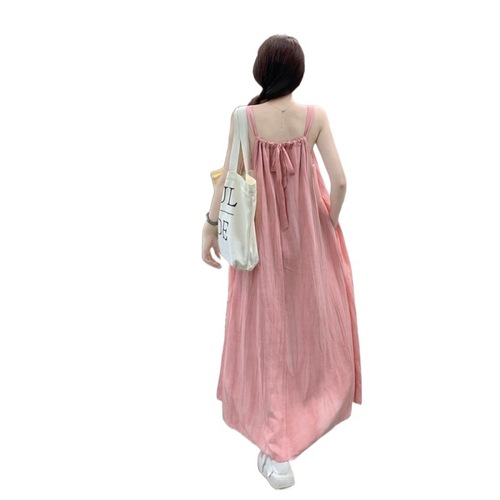 Vacation-style pink spaghetti strap dress for women, 2024 summer, loose and casual, flattering A-line midi dress