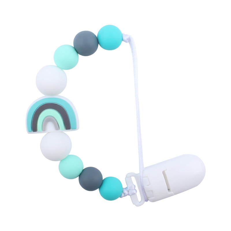Nuevo bebé suministros chupete cadena creativa de dibujos animados arco iris de silicona bebé mordedura molar anti-gota cadena