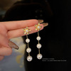 Fashionable earrings with bow from pearl, Korean style, wholesale