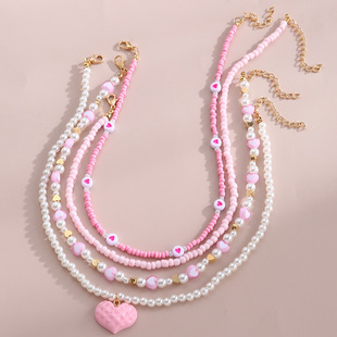 Cross-border European and American children's jewelry sweet pink love necklace imitation pearl rice beads handmade beaded cute jewelry