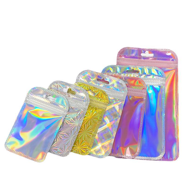 En stock color láser ziplock bolsa de joyería bolsa de película arco iris bolsa de papel de aluminio bolsa de plástico de color mágico fabricante