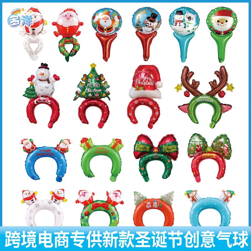 クリスマスのクリスマスツリーの老人雪だるまは棒のカチューシャの装飾品を持っています。|undefined