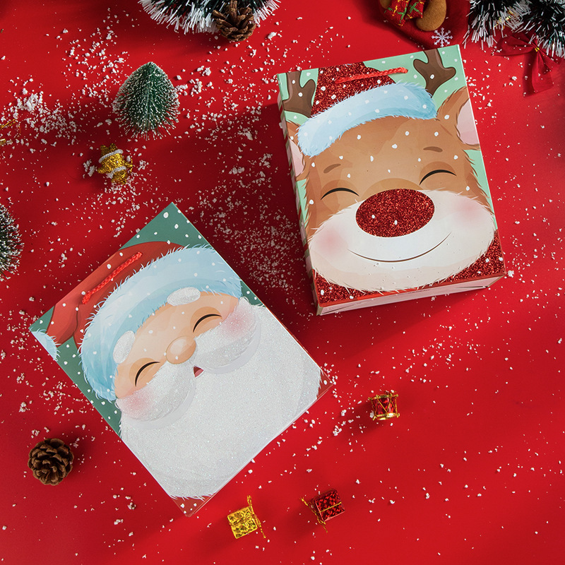 Navidad suelta Rosa dibujos animados muñeco de nieve Navidad ciervos Navidad Eve caja de regalo bolsa de regalo extra grande bolsa de papel portátil